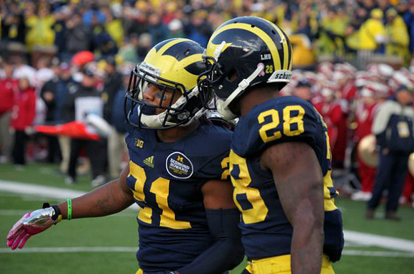 Jeremy Gallon (21) and Fitzgerald Toussaint (28)