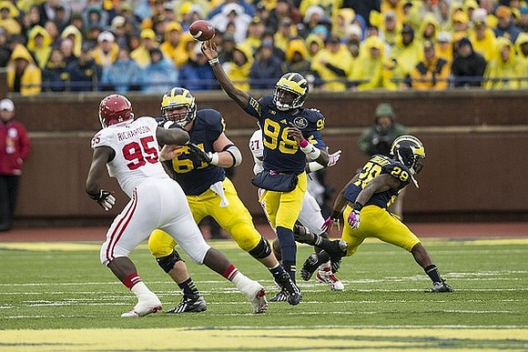 Graham Glasgow (61), Devin Gardner (98), and Fitzgerald Toussaint (28)