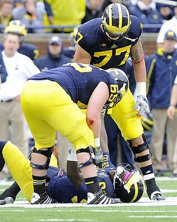 Devin Gardner (98), Kyle Bosch (65), and Taylor Lewan (77)