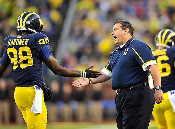 Devin Gardner (98), Brady Hoke, and Joe Kerridge (36)