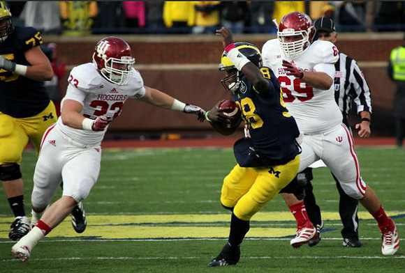 Michael Schofield (75) and Devin Gardner (98)