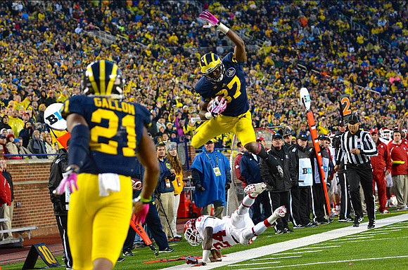 Devin Funchess (87) and Jeremy Gallon (21)