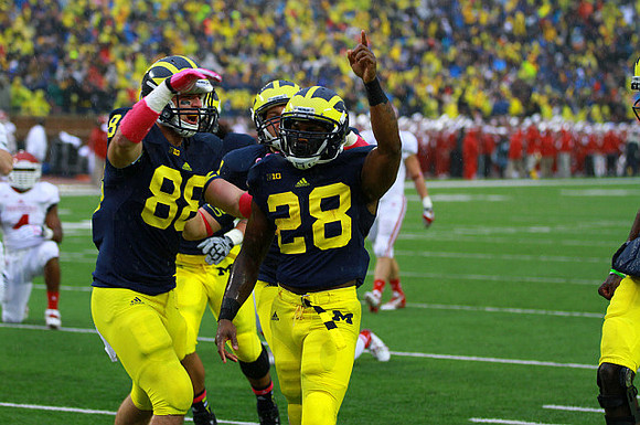 Jake Butt (88) and Fitzgerald Toussaint (28)