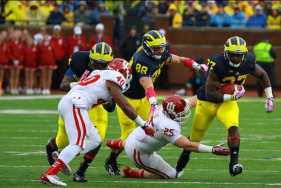 A.J. Williams (84), Jake Butt (88), and Derrick Green (27)