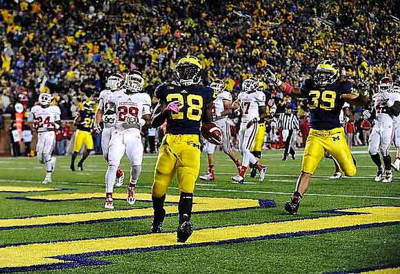 Jeremy Gallon (21), Fitzgerald Toussaint (28), and Sione Houma (39)