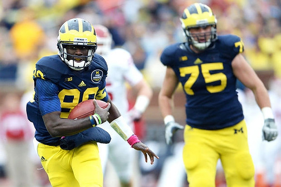 Devin Gardner (98) and Michael Schofield (75)