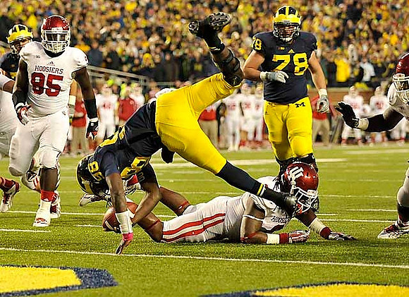 Devin Gardner (98) and Erik Magnuson (78)
