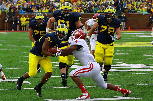 Jeremy Gallon (21), Michael Schofield (75), Graham Glasgow (61), and Erik Magnuson (78)