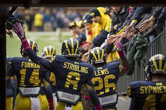 Josh Furman (14), Channing Stribling (8), Jourdan Lewis (26), and Scott Sypniewski (43)