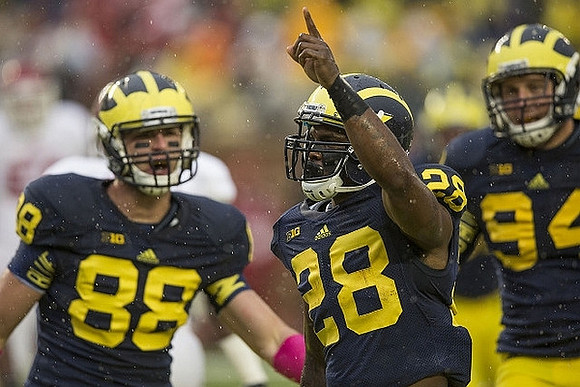 Jake Butt (88), Fitzgerald Toussaint (28), and Jordan Paskorz (94)