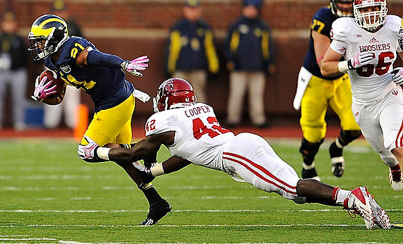 Jeremy Gallon (21) and Taylor Lewan (77)