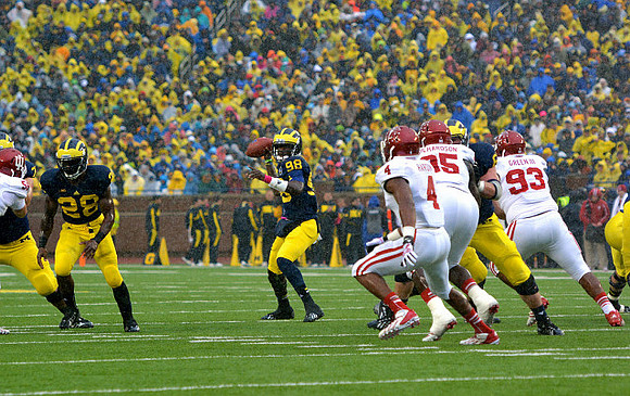 Fitzgerald Toussaint (28) and Devin Gardner (98)