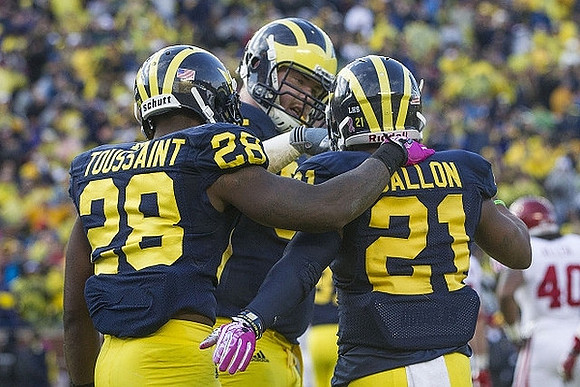 Fitzgerald Toussaint (28), Jeremy Gallon (21), and Graham Glasgow (61)