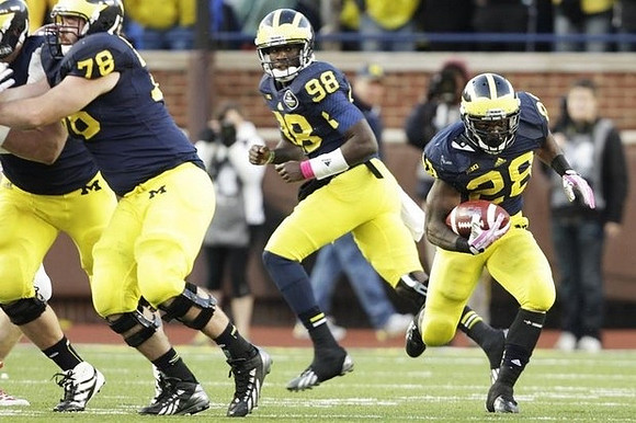 Erik Magnuson (78), Devin Gardner (98), and Fitzgerald Toussaint (28)