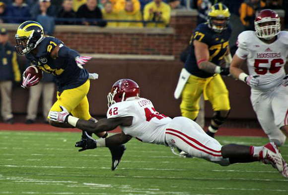 Jeremy Gallon (21) and Taylor Lewan (77)