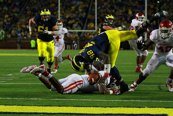 Graham Glasgow (61), Devin Gardner (98), and Kyle Bosch (65)