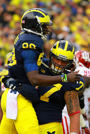Devin Gardner (98) and Taylor Lewan (77)