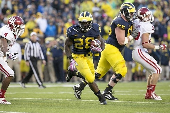 Fitzgerald Toussaint (28) and Kyle Bosch (65)