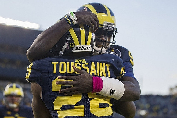 Fitzgerald Toussaint (28) and Devin Gardner (98)