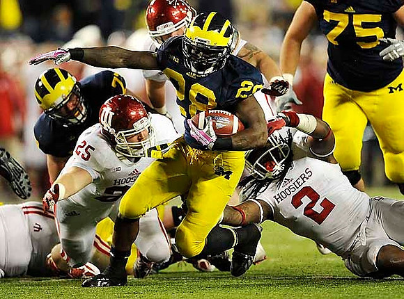 Taylor Lewan (77), Fitzgerald Toussaint (28), and Michael Schofield (75)