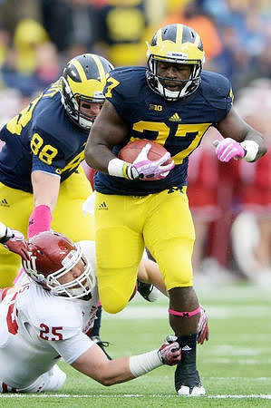 Jake Butt (88) and Derrick Green (27)