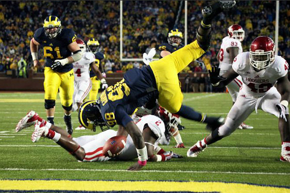 Devin Gardner (98), Graham Glasgow (61), and Kyle Bosch (65)