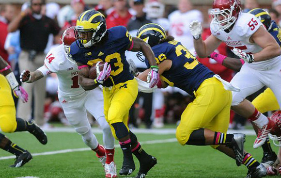 Dennis Norfleet (23) and Sione Houma (39)
