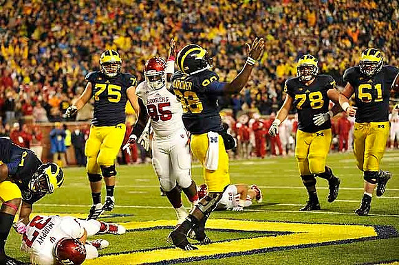 Devin Funchess (87), Michael Schofield (75), Devin Gardner (98), Erik Magnuson (78), and Graham Glasgow (61)