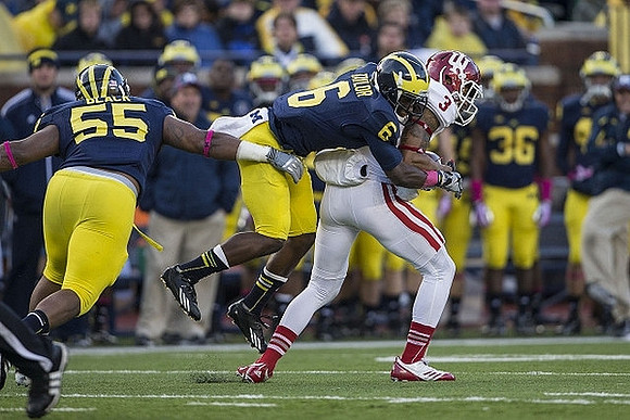 Jibreel Black (55) and Raymon Taylor (6)