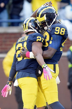 Jeremy Gallon (21) and Devin Gardner (98)