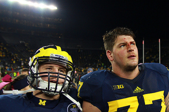 Desmond Morgan (48) and Taylor Lewan (77)