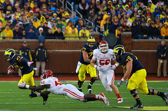 Jeremy Gallon (21), Taylor Lewan (77), and Erik Magnuson (78)