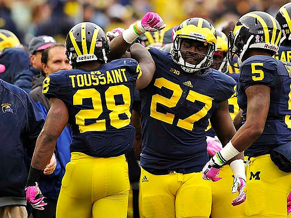 Fitzgerald Toussaint (28), Derrick Green (27), and Justice Hayes (5)