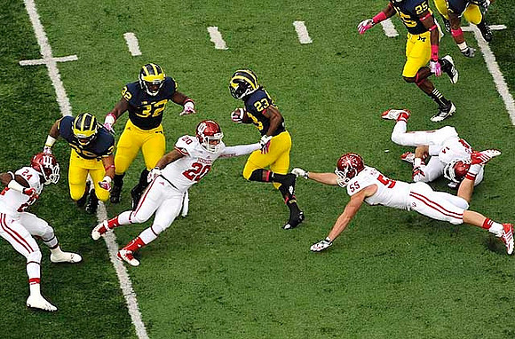 Sione Houma (39), De'Veon Smith (32), Dennis Norfleet (23), and Dymonte Thomas (25)