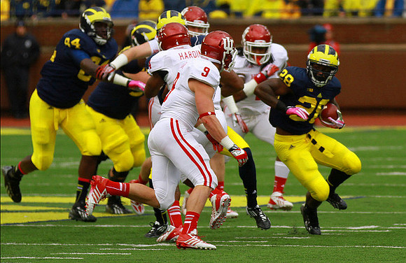 A.J. Williams (84) and Fitzgerald Toussaint (28)