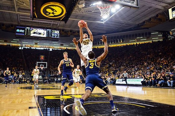 Xavier Simpson (3), Moritz Wagner (13), and Duncan Robinson (22)