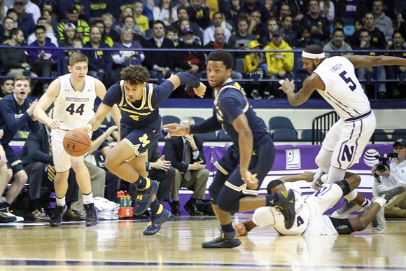 Isaiah Livers (4) and Zavier Simpson (3)