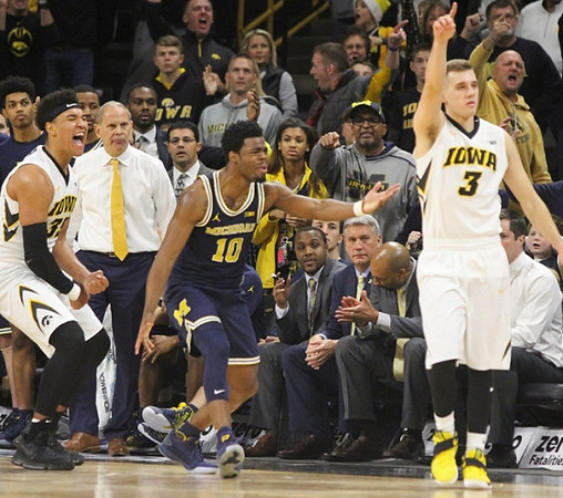 John Beilein and Derrick Walton Jr. (10)