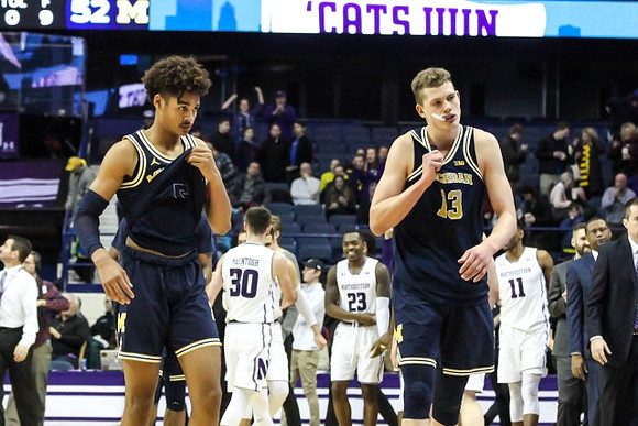 Jordan Poole (2) and Moritz Wagner (13)