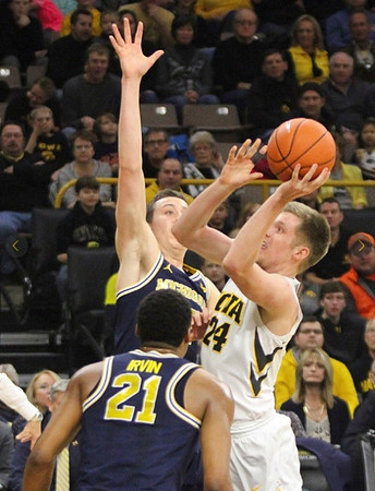Zak Irvin (21) and Duncan Robinson (22)
