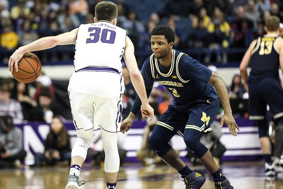 Zavier Simpson (3) and Moritz Wagner (13)