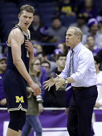 Moritz Wagner (13) and John Beilein
