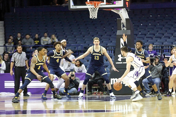 Charles Matthews (1), Isaiah Livers (4), Moritz Wagner (13), and Zavier Simpson (3)