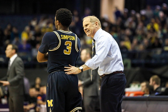 Zavier Simpson (3) and John Beilein