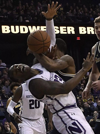 Charles Matthews (1), Moritz Wagner (13), and Jordan Poole (2)