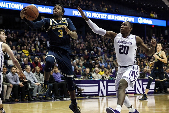 Zavier Simpson (3) and Duncan Robinson (22)