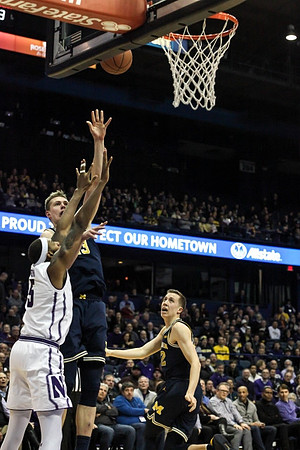 Moritz Wagner (13) and Duncan Robinson (22)