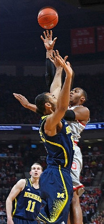 Nik Stauskas (11) and Jon Horford (15)
