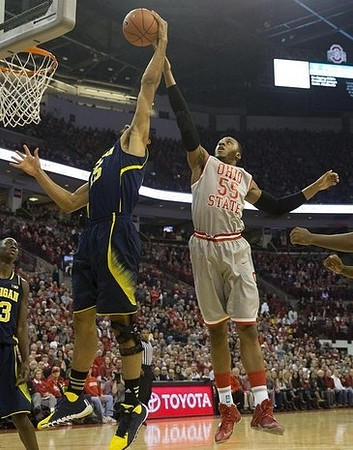 Caris LeVert (23) and Jon Horford (15)
