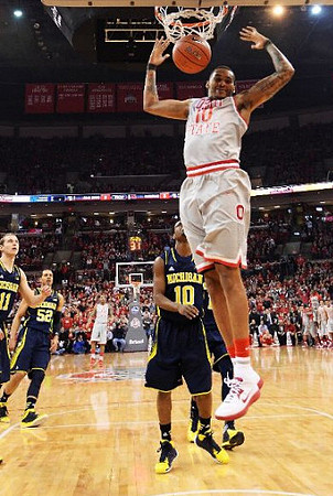 Nik Stauskas (11), Jordan Morgan (52), and Derrick Walton Jr. (10)